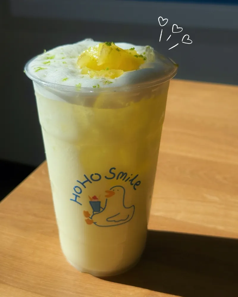 Pineapple tea with cheese foam and pineapple topping at Hoho Smile, a Bubble Tea Store in Glendale